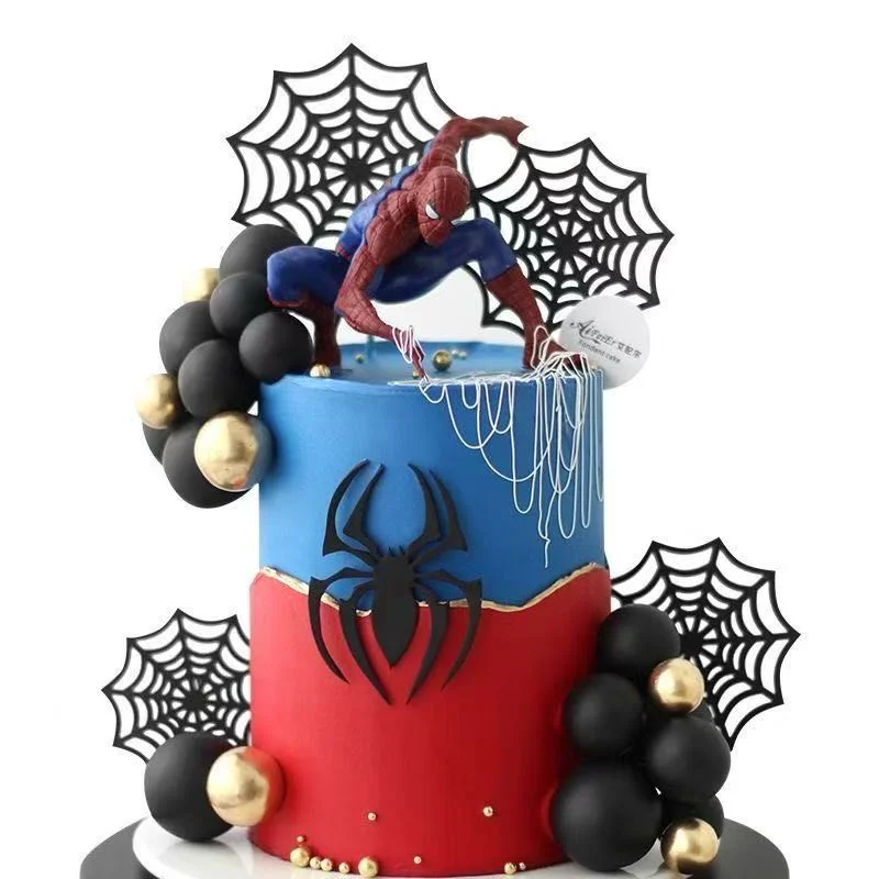 Spiderman-Inspired 2-Tier Birthday Cake Blue and red 2-tier soft icing birthday cake with a Spiderman figure, black spheres, and spider web printouts