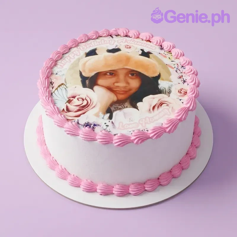 Photo Birthday White Floral Cake A white round Photo Birthday cake with pink icing borders, an edible photo, and butterfly and rose accents.