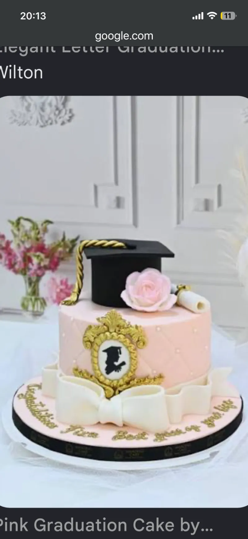 Pink quilted fondant graduation cake with a black cap, white bow, and gold frame Pink quilted fondant graduation cake with a black cap, white bow, and gold frame