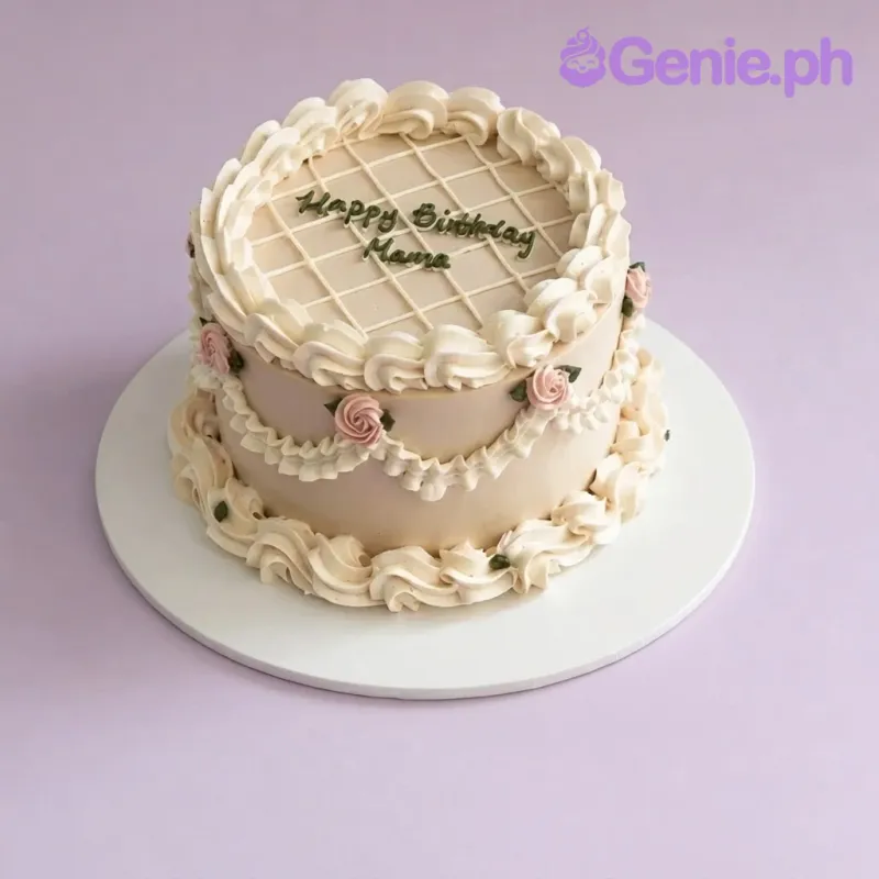 Beige 1-tier cake with soft icing, piped white borders, pink rosettes, and green piped text Beige 1-tier cake with soft icing, piped white borders, pink rosettes, and green piped text