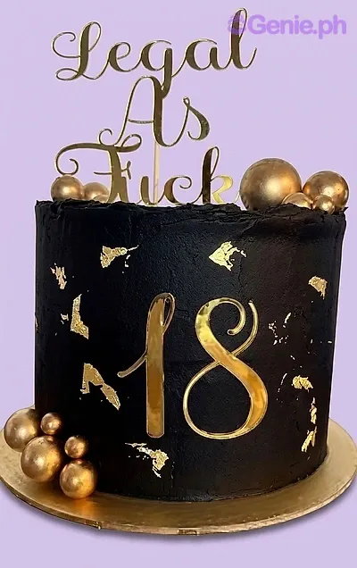 Black 18th birthday cake with gold leaf accents, gold spheres, and a 'Legal As Fuck' gold topper. Black 18th birthday cake with gold leaf accents, gold spheres, and a 'Legal As Fuck' gold topper.