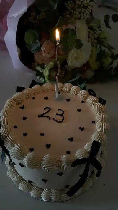 23rd birthday 1 Tier - colorful theme with wavy birthday candle and small piped hearts 23rd birthday 1 Tier - colorful theme with wavy birthday candle and small piped hearts