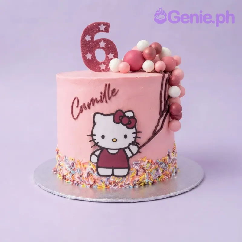 Pink 1-tier cake with Hello Kitty character, number 6 topper, and fondant ball cluster Pink 1-tier cake with Hello Kitty character, number 6 topper, and fondant ball cluster