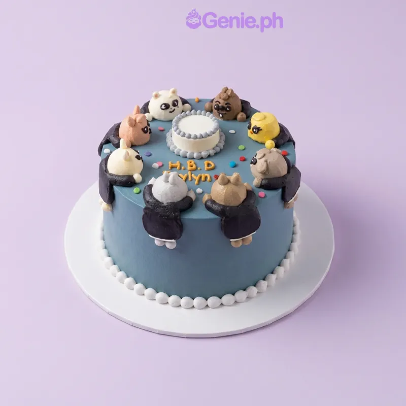 Blue 1-tier birthday cake with eight small animal character figures and a mini cake topper Blue 1-tier birthday cake with eight small animal character figures and a mini cake topper