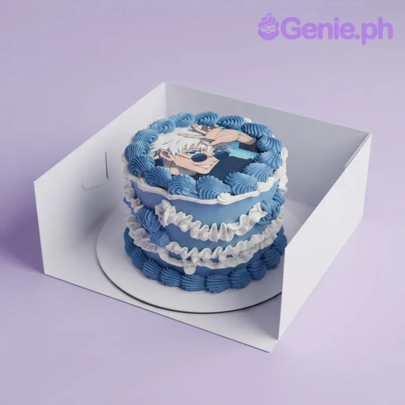 Light blue 1-tier cake with soft icing, piped blue rosettes, and an anime character edible photo top Light blue 1-tier cake with soft icing, piped blue rosettes, and an anime character edible photo top