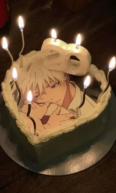 White 1-tier cake with smooth soft icing, an anime character edible photo, and a number candle White 1-tier cake with smooth soft icing, an anime character edible photo, and a number candle