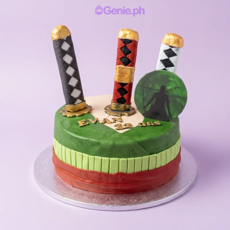 Green and peach fondant cake with three sword hilt toppers and an anime silhouette printout Green and peach fondant cake with three sword hilt toppers and an anime silhouette printout