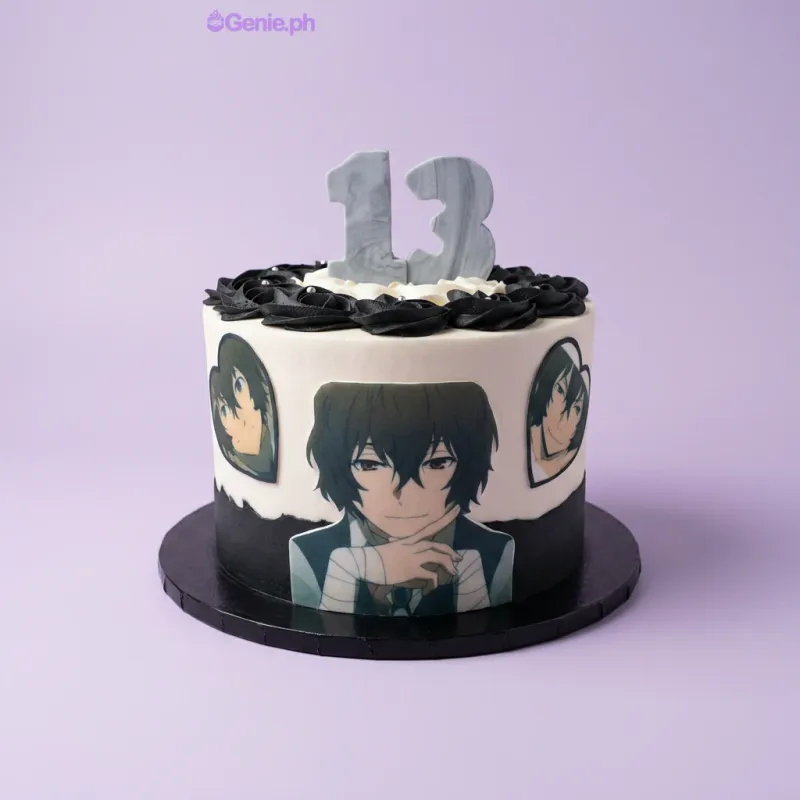 A white and black 1-tier cake themed Anime, featuring a silver '13' and character cutouts, with black rosettes and silver pearls. A white and black 1-tier cake themed Anime, featuring a silver '13' and character cutouts, with black rosettes and silver pearls.