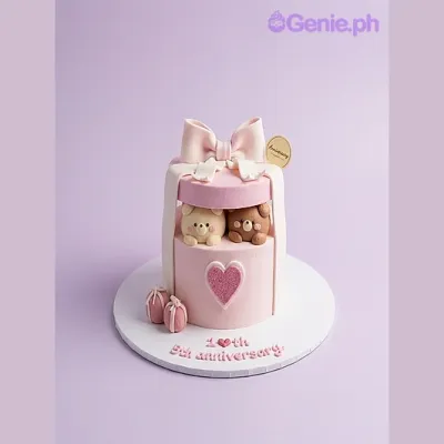 Pink 1-tier fondant cake for anniversary with two 3D bear figures and a large white fondant bow on top Pink 1-tier fondant cake for anniversary with two 3D bear figures and a large white fondant bow on top