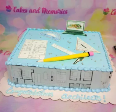 Sky blue rectangle cake with soft icing, architecture theme, and blueprint and drafting tool printouts Sky blue rectangle cake with soft icing, architecture theme, and blueprint and drafting tool printouts