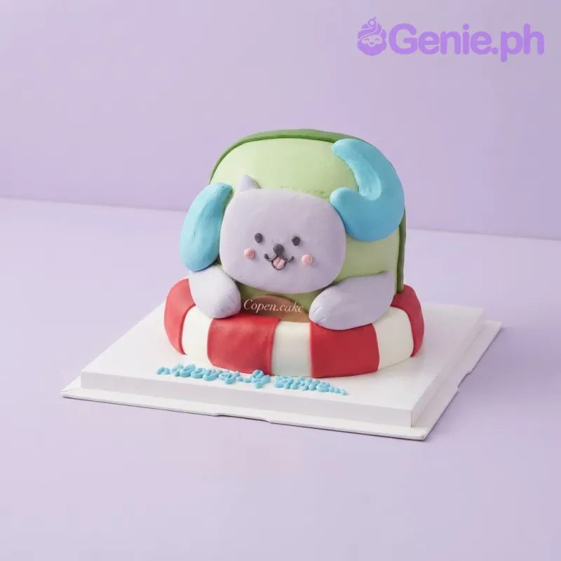 Light green 1-tier cake with soft icing, a purple character figure in a turtle shell, and a red and white float ring Light green 1-tier cake with soft icing, a purple character figure in a turtle shell, and a red and white float ring