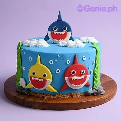 Baby Shark 1 Tier Fondant - blue, yellow, red theme with blue shark character and yellow shark cutout Baby Shark 1 Tier Fondant - blue, yellow, red theme with blue shark character and yellow shark cutout