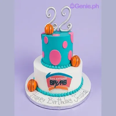 2-tier basketball themed birthday cake with teal and white fondant, pink polka dots, and a silver number 22 topper 2-tier basketball themed birthday cake with teal and white fondant, pink polka dots, and a silver number 22 topper