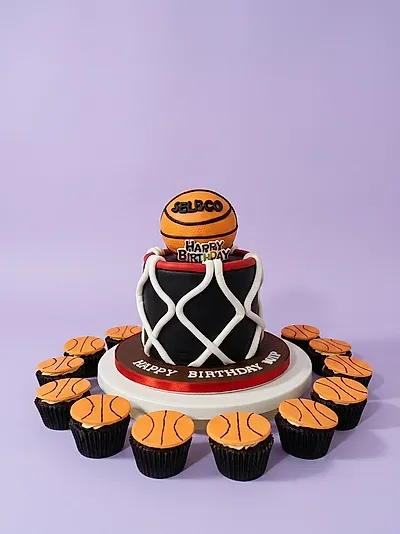 Basketball colorful cake design — 1 layer fondant cake in black — with basketball, name 'JALECO' on basketball, and custom "HAPPY BIRTHDAY" message Basketball colorful cake design — 1 layer fondant cake in black — with basketball, name 'JALECO' on basketball, and custom "HAPPY BIRTHDAY" message