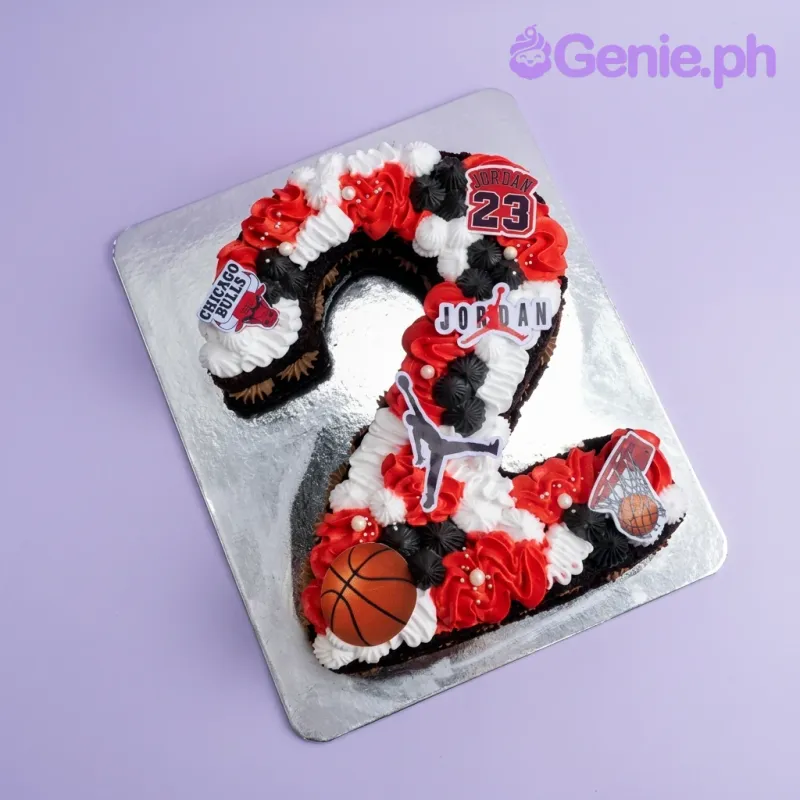 A multi-colored Rectangle Michael Jordan Basketball cake, with a 3D basketball and Jordan printouts. A multi-colored Rectangle Michael Jordan Basketball cake, with a 3D basketball and Jordan printouts.