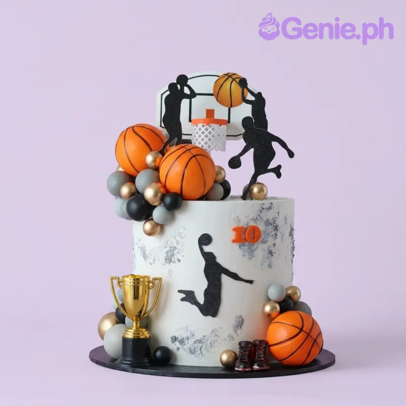 A white Basketball-themed 1-Tier cake, featuring a hoop, player silhouettes, a trophy, and basketballs. A white Basketball-themed 1-Tier cake, featuring a hoop, player silhouettes, a trophy, and basketballs.