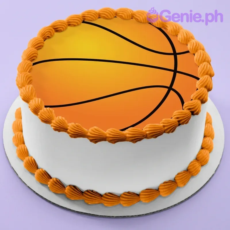 A white and orange 1 Tier Round cake themed around Basketball, featuring a large basketball graphic printout and orange icing shell borders. A white and orange 1 Tier Round cake themed around Basketball, featuring a large basketball graphic printout and orange icing shell borders.