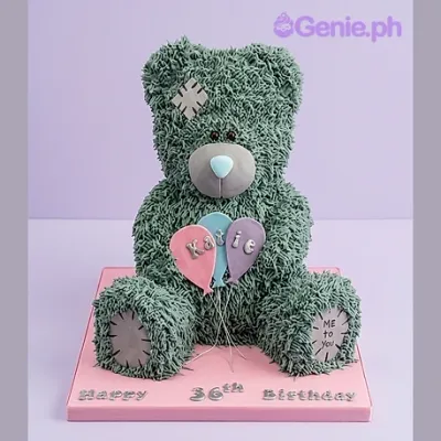 Grey bear-shaped cake with piped fur texture, holding three pastel balloons, with a name on the side and a birthday message on the board Grey bear-shaped cake with piped fur texture, holding three pastel balloons, with a name on the side and a birthday message on the board