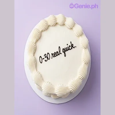 White round cake with black piped text 0-30 real quick and white piped border White round cake with black piped text 0-30 real quick and white piped border
