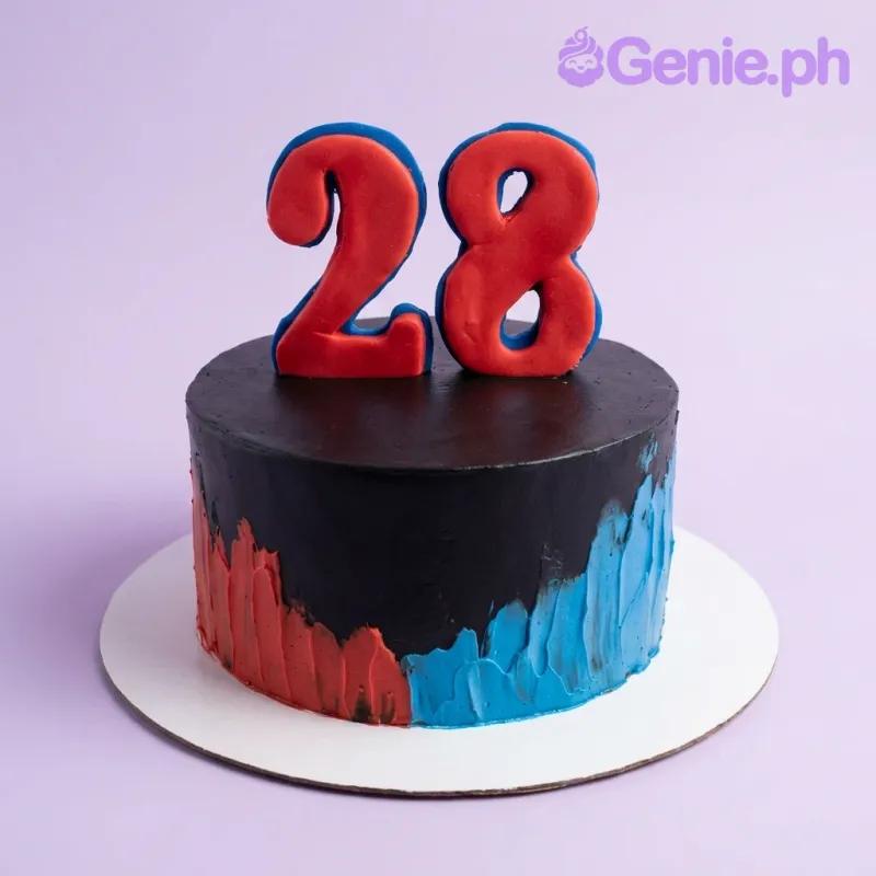 A black 1-tier minimalist cake, featuring a large red number 28 topper and red and blue palette knife icing textures. A black 1-tier minimalist cake, featuring a large red number 28 topper and red and blue palette knife icing textures.
