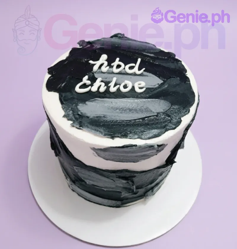 A black and white 1 Tier cake themed around Minimalism, featuring textured palette knife icing and a handwritten 'hbd Chloe' message. A black and white 1 Tier cake themed around Minimalism, featuring textured palette knife icing and a handwritten 'hbd Chloe' message.