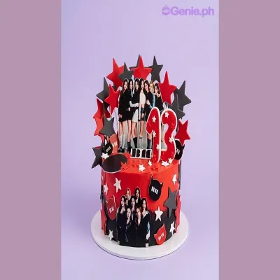 Red 1-tier birthday cake with Blackpink group photo printouts and a number 13 candle Red 1-tier birthday cake with Blackpink group photo printouts and a number 13 candle