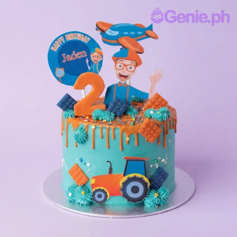 Sky blue 1-tier soft icing cake with a drip effect, Blippi theme, character printout, and an age topper Sky blue 1-tier soft icing cake with a drip effect, Blippi theme, character printout, and an age topper