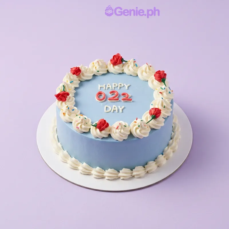 Light blue 1-tier birthday cake with piped white rosettes, red roses, and colorful sprinkles Light blue 1-tier birthday cake with piped white rosettes, red roses, and colorful sprinkles