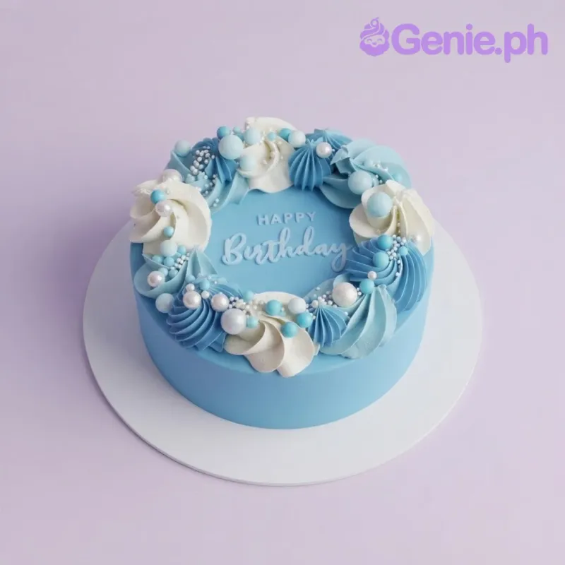 Light blue bento and cupcakes with piped white and blue icing rosettes, pearls, and a birthday message Light blue bento and cupcakes with piped white and blue icing rosettes, pearls, and a birthday message