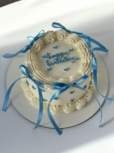 blue ribbon minimalist 1 Tier - white, blue theme with piped blue hearts on top and side blue ribbon minimalist 1 Tier - white, blue theme with piped blue hearts on top and side