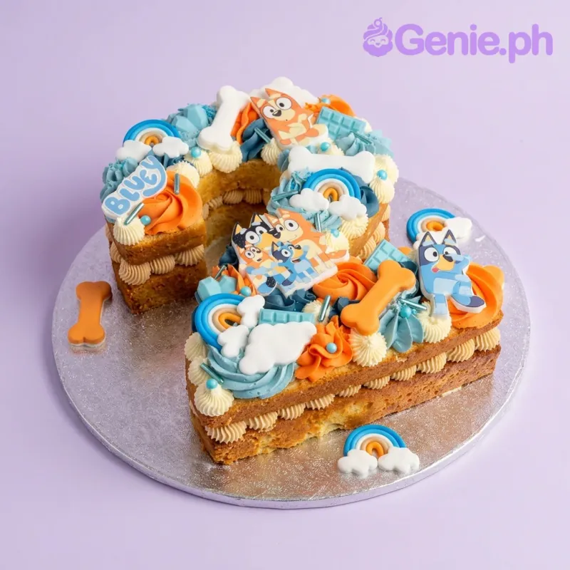 A white, orange, and blue number 2 cake, Bluey-themed, with character printouts, icing rosettes, and bone toppers. A white, orange, and blue number 2 cake, Bluey-themed, with character printouts, icing rosettes, and bone toppers.