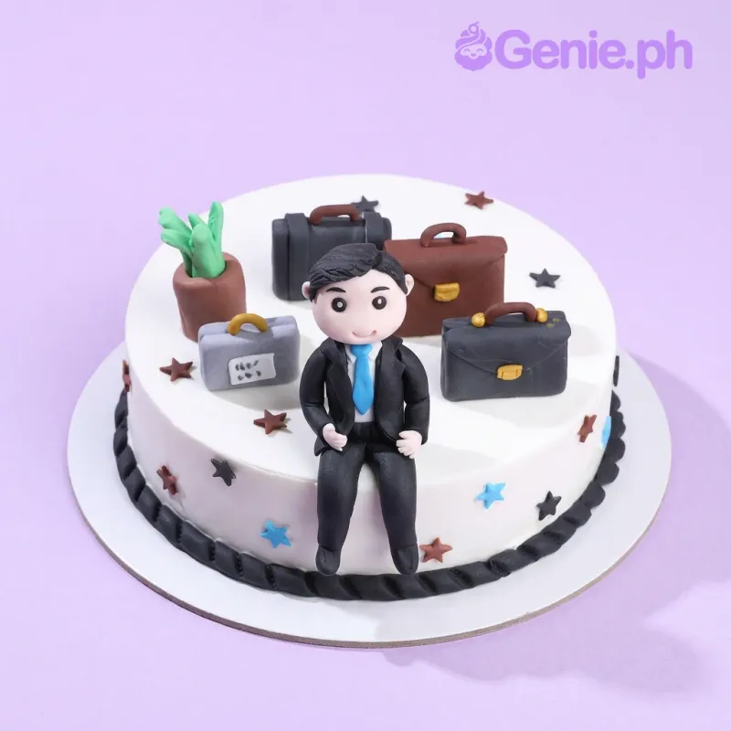White 1-tier cake with a businessman figure, briefcases, and a potted plant topper White 1-tier cake with a businessman figure, briefcases, and a potted plant topper