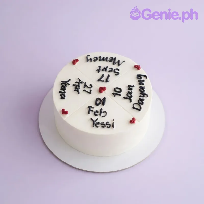 White 1 tier cake with smooth soft icing, calendar design, and dark red piped heart accents White 1 tier cake with smooth soft icing, calendar design, and dark red piped heart accents