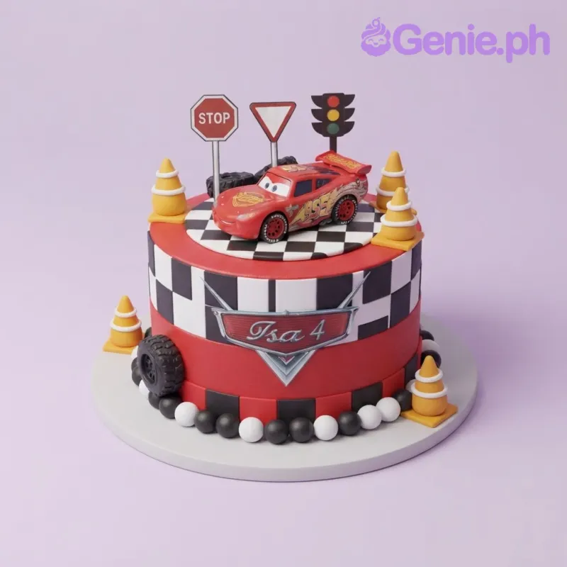 Red fondant cake with a Lightning McQueen car topper, traffic signs, orange cones, and a checkered racing pattern Red fondant cake with a Lightning McQueen car topper, traffic signs, orange cones, and a checkered racing pattern