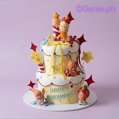 White 2-tier birthday cake with character figurines and star cutouts White 2-tier birthday cake with character figurines and star cutouts