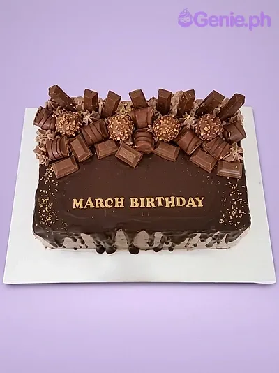 A brown and gold Rectangle chocolate birthday cake, with chocolate bars, truffles, gold sprinkles, and gold 'MARCH BIRTHDAY' text. A brown and gold Rectangle chocolate birthday cake, with chocolate bars, truffles, gold sprinkles, and gold 'MARCH BIRTHDAY' text.
