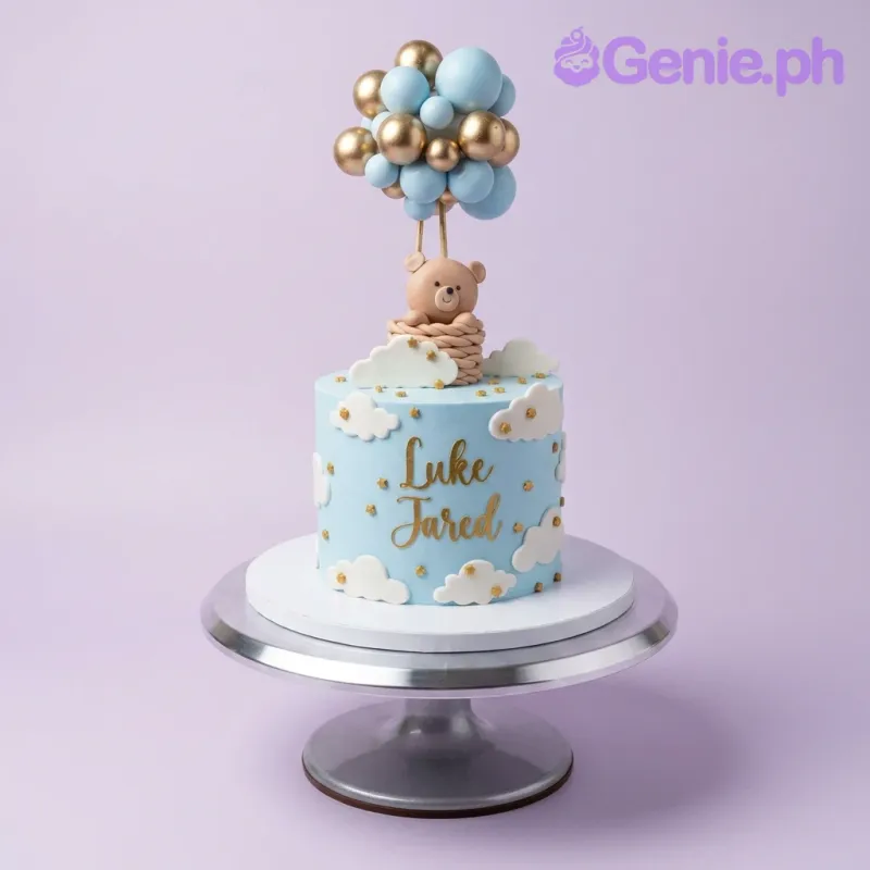 Light blue Christening cake with a bear in a hot air balloon, blue and gold balloons, and white clouds. Light blue Christening cake with a bear in a hot air balloon, blue and gold balloons, and white clouds.