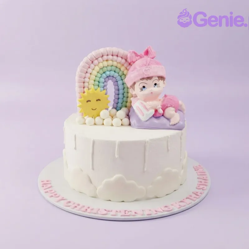 A white 1-tier cake themed around Christening, featuring a 3D baby figure, pastel rainbow, sun, and fondant clouds. A white 1-tier cake themed around Christening, featuring a 3D baby figure, pastel rainbow, sun, and fondant clouds.