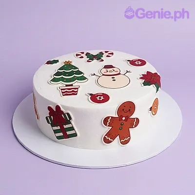 Christmas cutout cake design — 1 layer fondant cake in white — with Christmas tree cutout, Snowman cutout, Candy cane cutout, and Gingerbread man cutout Christmas cutout cake design — 1 layer fondant cake in white — with Christmas tree cutout, Snowman cutout, Candy cane cutout, and Gingerbread man cutout