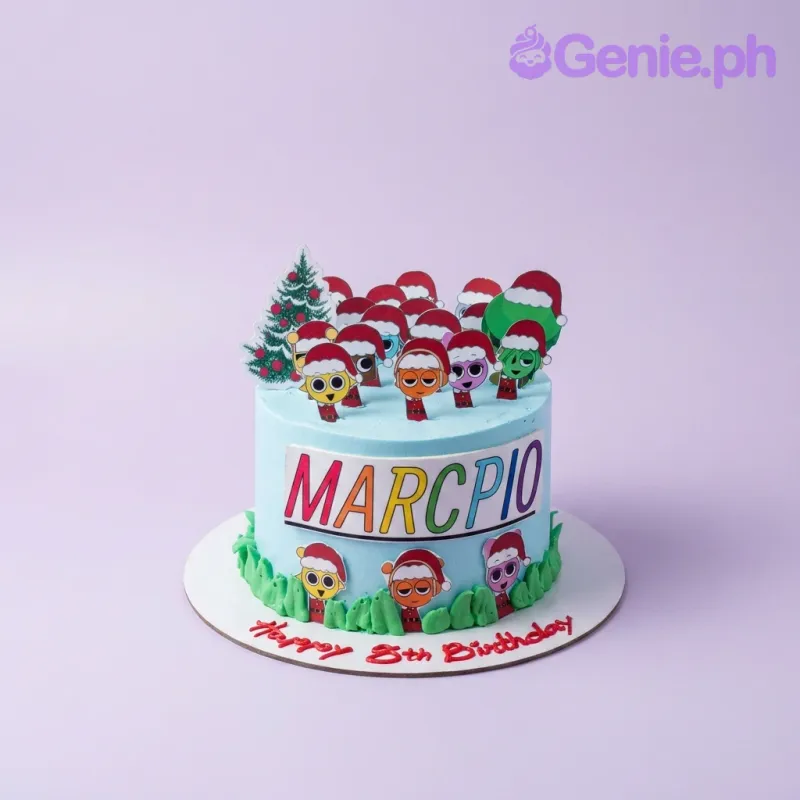 A light blue cake with a Christmas character theme, featuring character printouts, a tree topper, and green icing grass border. A light blue cake with a Christmas character theme, featuring character printouts, a tree topper, and green icing grass border.
