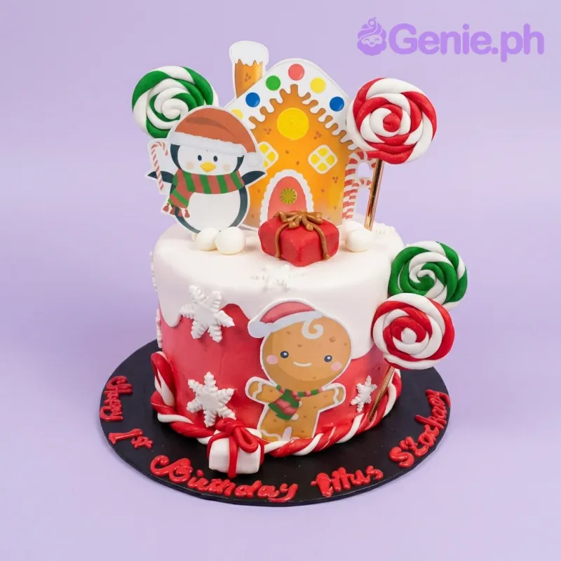 Christmas Penguin 1 Tier Fondant - red, white, green theme with penguin with santa hat and red and green swirl lollipops Christmas Penguin 1 Tier Fondant - red, white, green theme with penguin with santa hat and red and green swirl lollipops