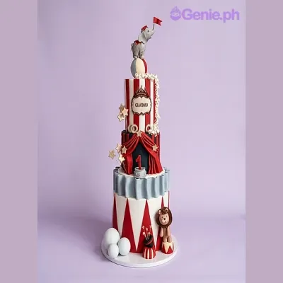3-tier circus themed fondant cake with elephant and lion toppers 3-tier circus themed fondant cake with elephant and lion toppers