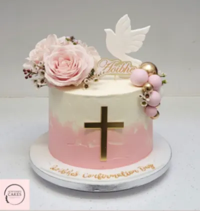 White 1-tier confirmation cake with soft icing, pink roses, a white dove topper, and gold name topper White 1-tier confirmation cake with soft icing, pink roses, a white dove topper, and gold name topper