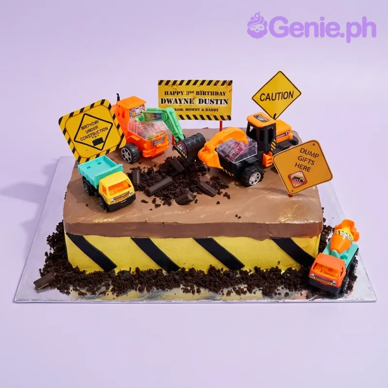 Construction themed rectangle cake with yellow and black hazard stripes, brown icing, and toy construction vehicles like excavators and dump trucks. Construction themed rectangle cake with yellow and black hazard stripes, brown icing, and toy construction vehicles like excavators and dump trucks.
