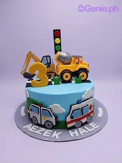 A light blue and yellow 1 Tier cake themed around construction, featuring a toy excavator, cement mixer, and number three, with a traffic light, road, ambulance, clouds, and grass decorations. A light blue and yellow 1 Tier cake themed around construction, featuring a toy excavator, cement mixer, and number three, with a traffic light, road, ambulance, clouds, and grass decorations.