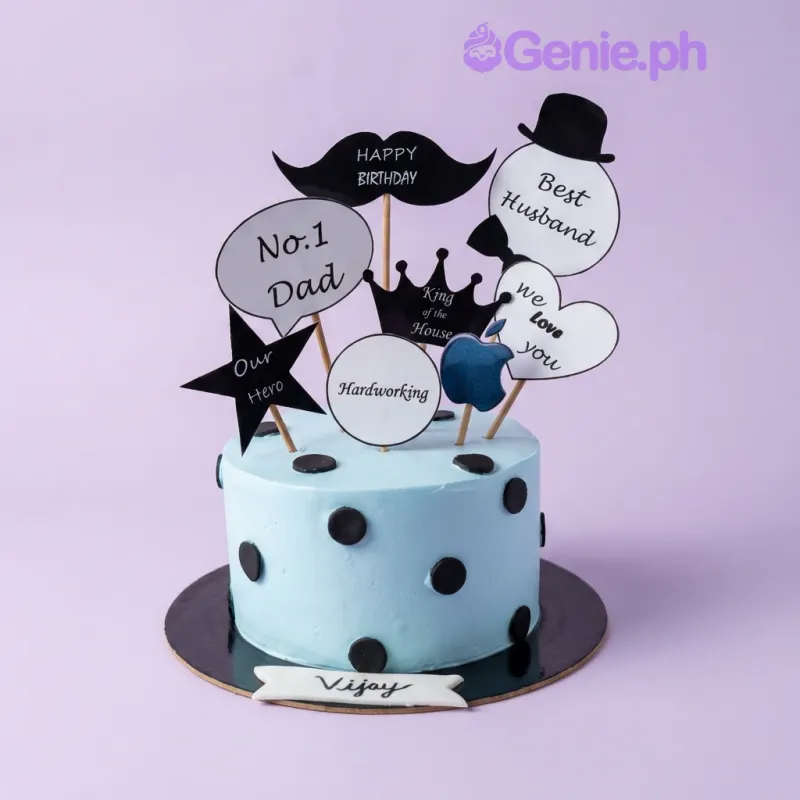 Light blue 1-tier birthday cake with black polka dots and assorted printed message cutouts for dad Light blue 1-tier birthday cake with black polka dots and assorted printed message cutouts for dad