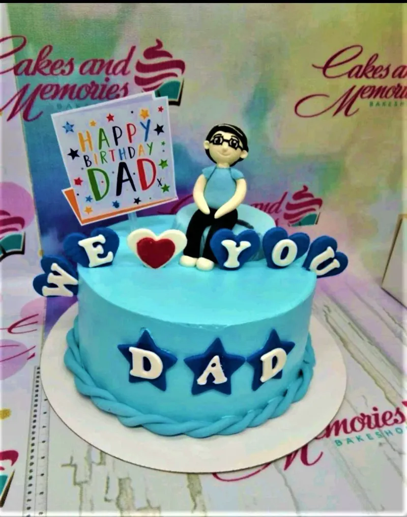 Light blue 1-tier birthday cake for Dad with a fondant male figure, stars, and a Happy Birthday Dad printout topper. Light blue 1-tier birthday cake for Dad with a fondant male figure, stars, and a Happy Birthday Dad printout topper.