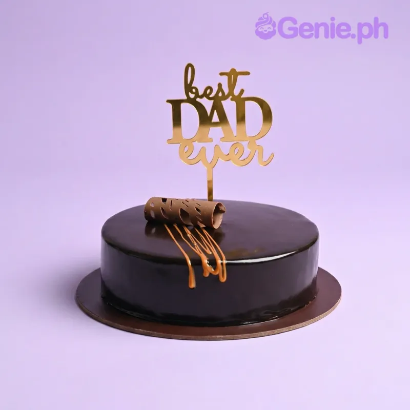 Black single-tier cake with gold Best Dad Ever topper and chocolate drip Black single-tier cake with gold Best Dad Ever topper and chocolate drip