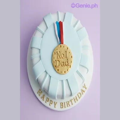 White 1-tier cake with a gold medal fondant topper and Happy Birthday message on the base board White 1-tier cake with a gold medal fondant topper and Happy Birthday message on the base board