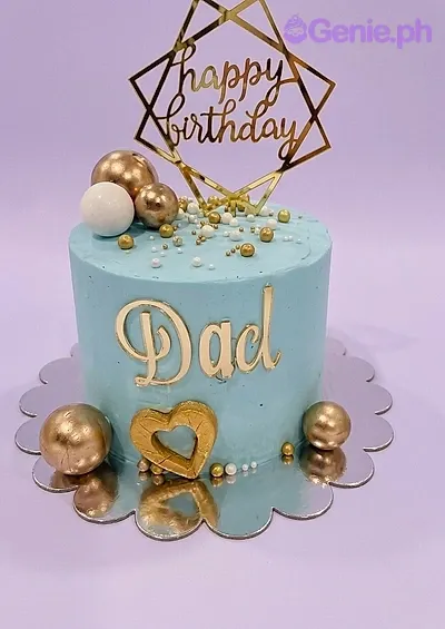 Light blue single tier birthday cake for Dad with gold geometric topper, gold spheres, and a gold heart accent. Light blue single tier birthday cake for Dad with gold geometric topper, gold spheres, and a gold heart accent.